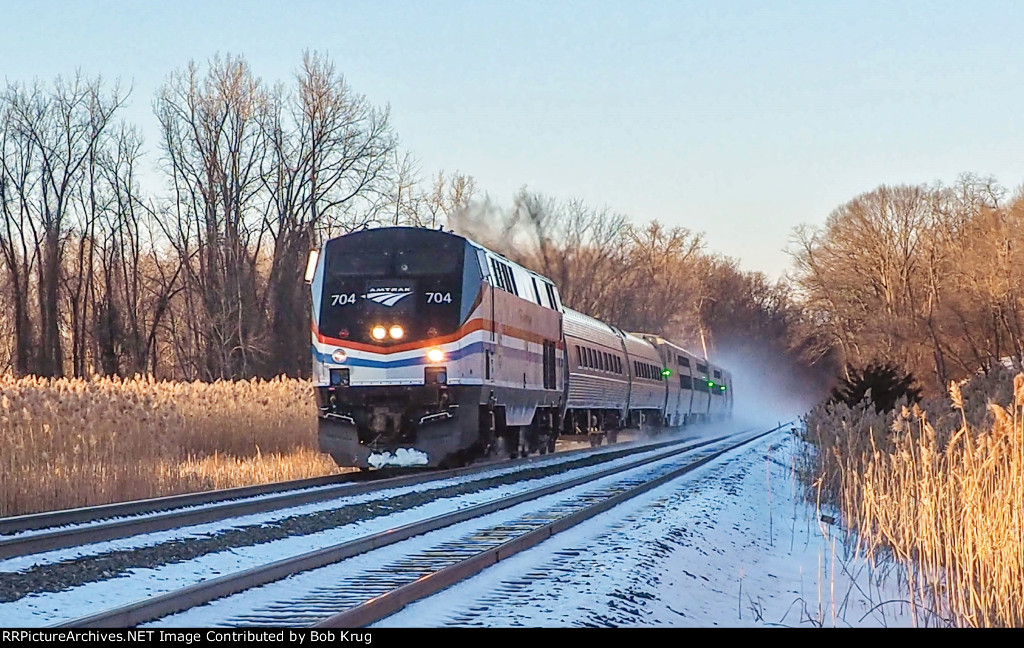 AMTK 704 leads the New York section of the Lake Shore Limited southbound at Nutten Hook , NY